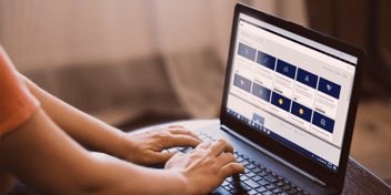 Person on laptop looking at Microsoft Dynamics 365