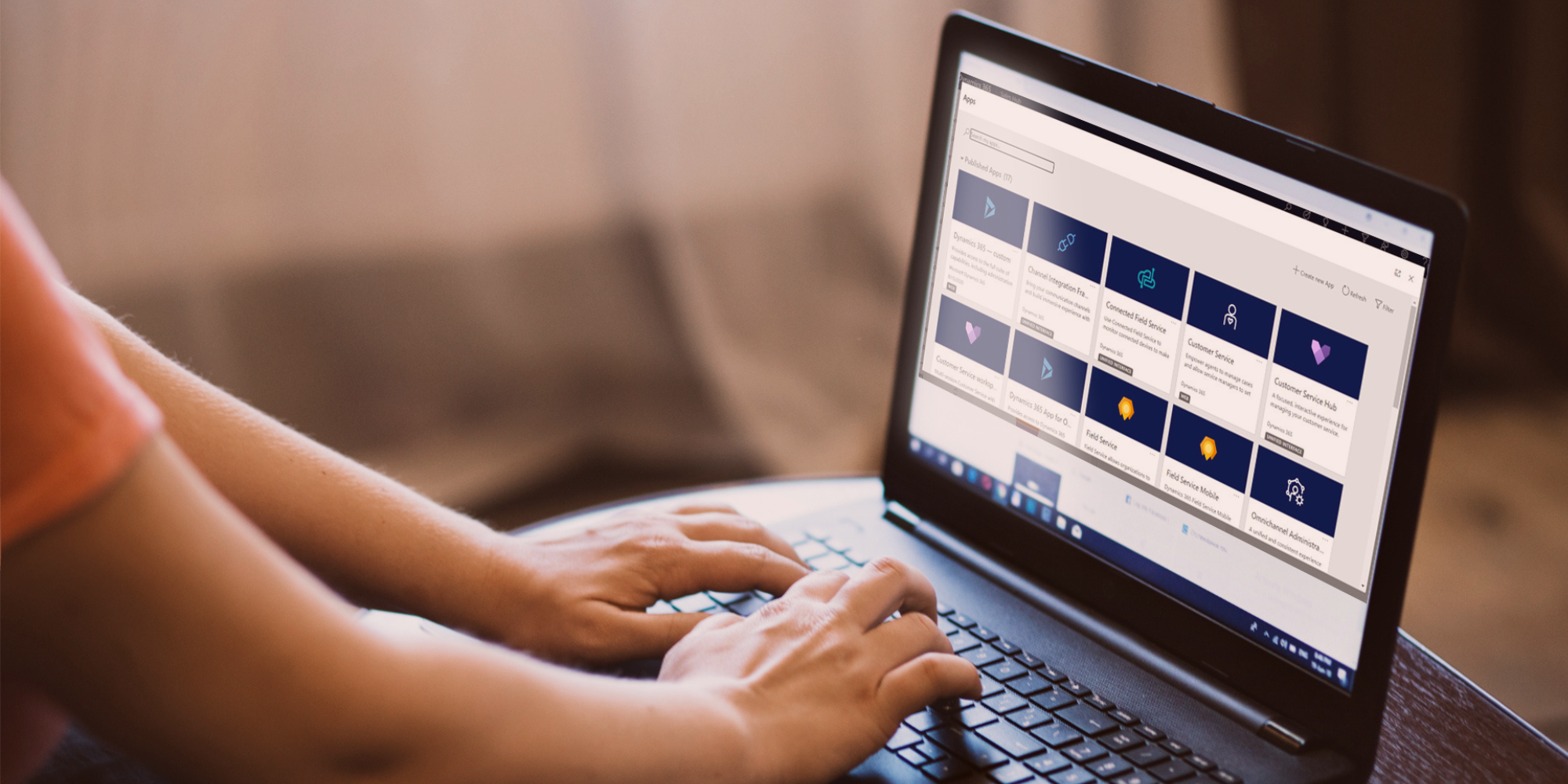 Person on laptop looking at Microsoft Dynamics 365