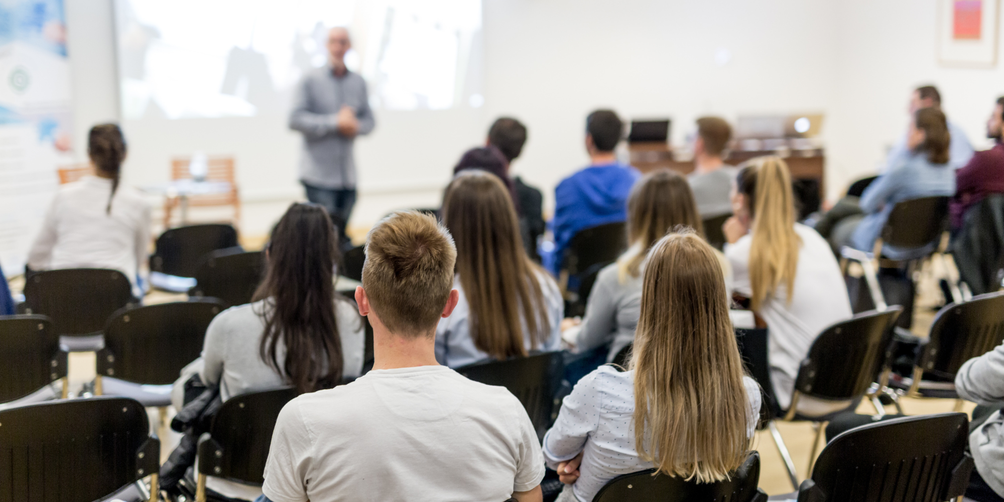 University Students in a classroom lecture student attendance